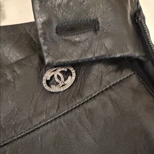 Authentic CHANEL Elegant Black Leather pants so cute 38 runs small